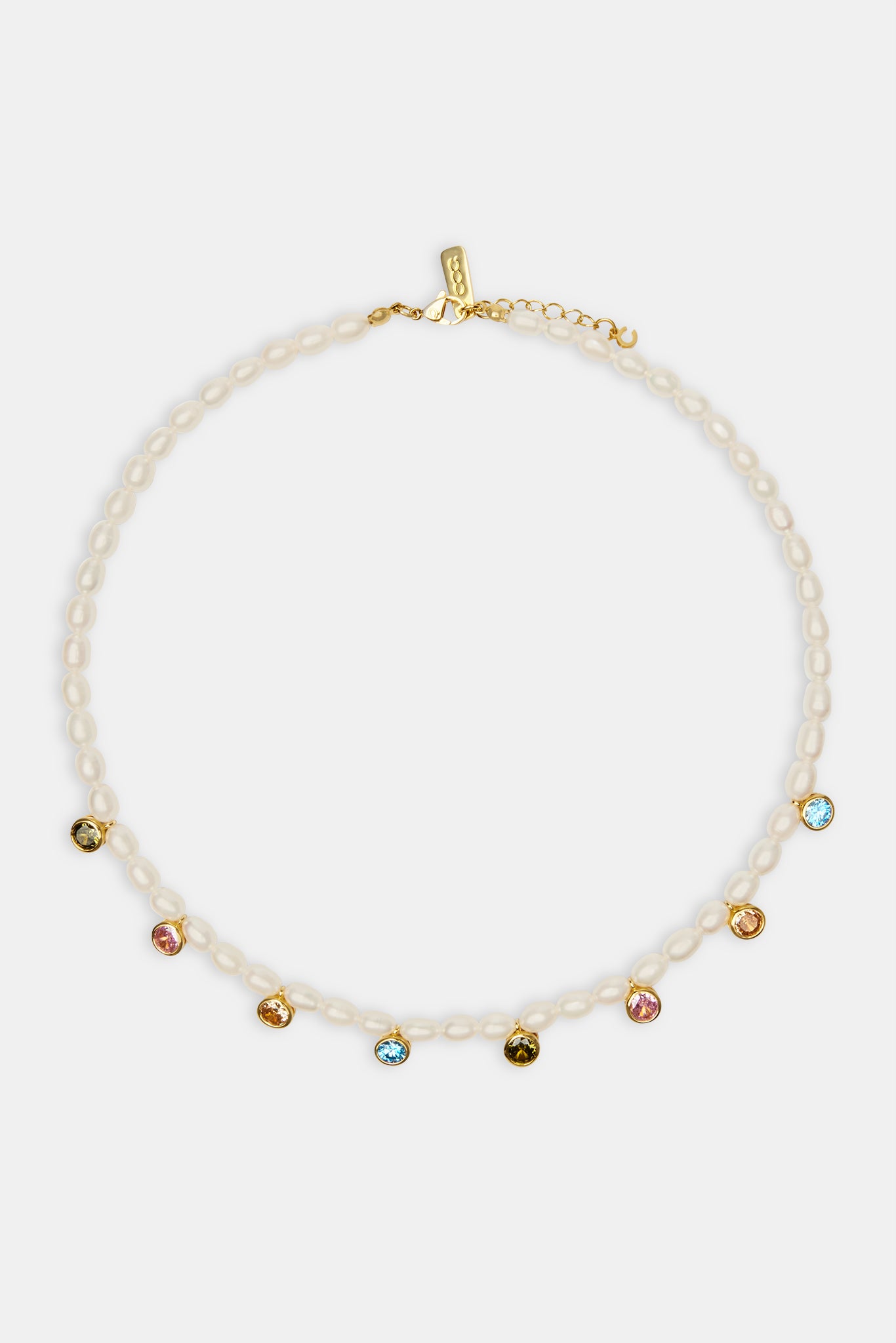 Freshwater pearl drop gem necklace on white background